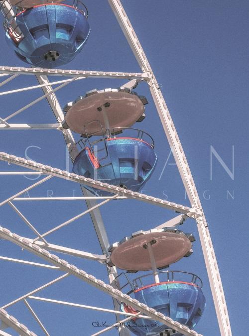 The Ferris Wheel Under Blue Sky
